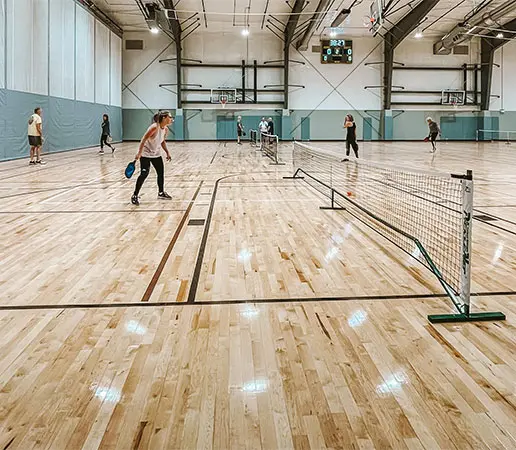 Athletes on pickleball court